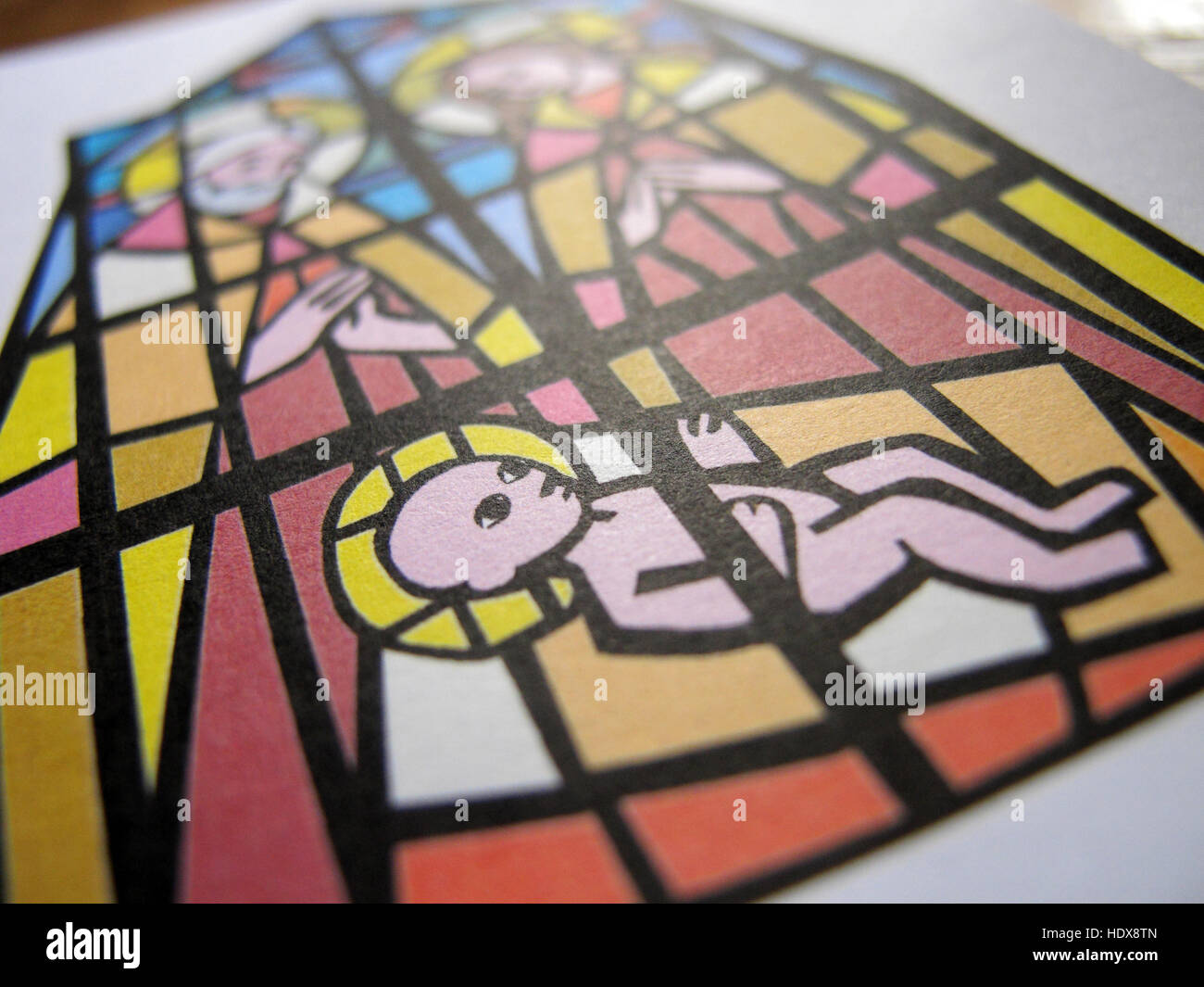 Grafische Darstellung der Geburt Jesu in Bethlehem, als eine Hymne carol Blatt in der Weise ein Buntglasfenster Stockfoto