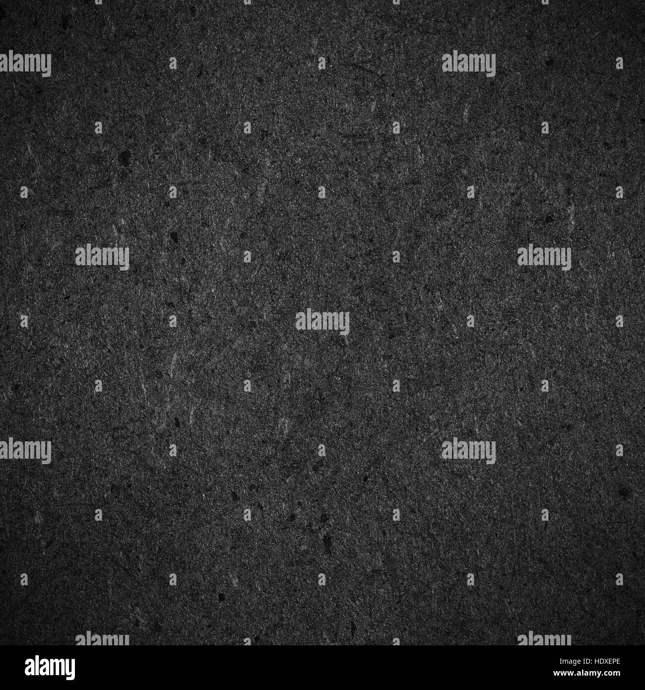 Schwarzer Karton Hintergrund oder grobe Muster Korn Papierstruktur Stockfoto