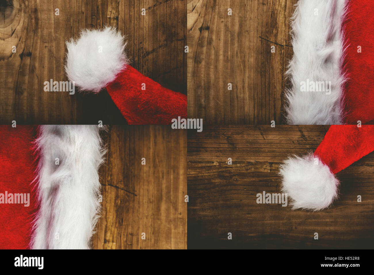 Weihnachtsmann-Mütze auf hölzernen Schreibtisch, Ansicht von oben Stockfoto