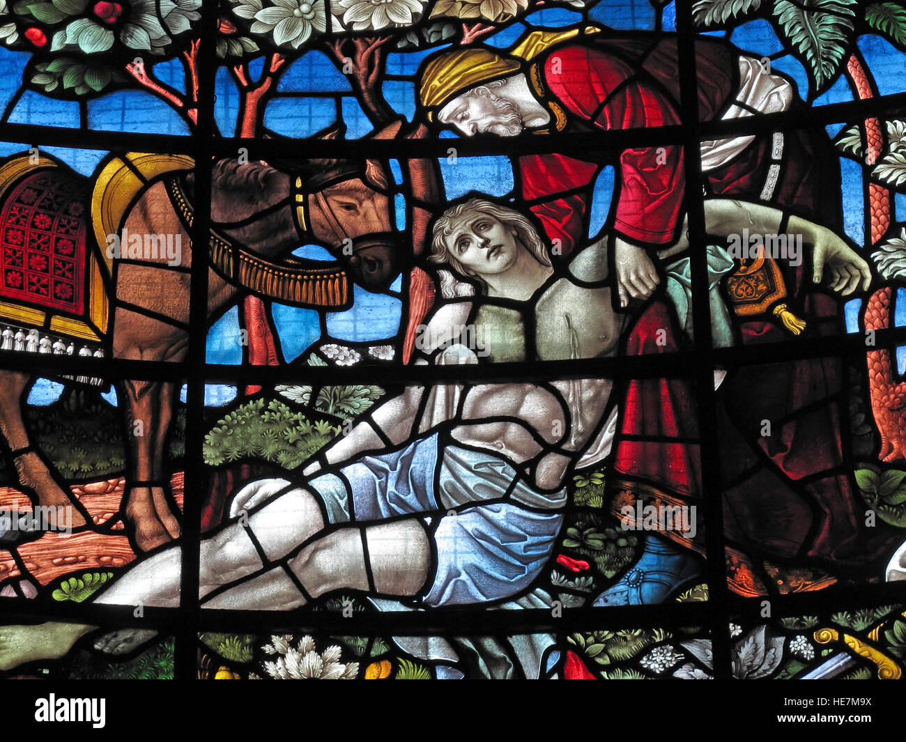 St Annes Belfast Cathedral Interior, Glasmalerei, Jesus, Esel, vom Kreuz abgenommen Stockfoto