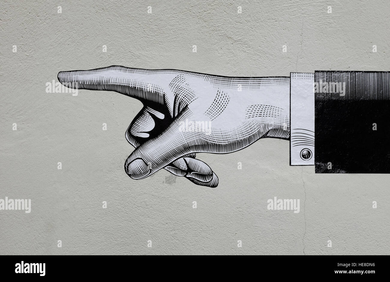 Abbildung von Hand auf Mauerbau Stockfoto