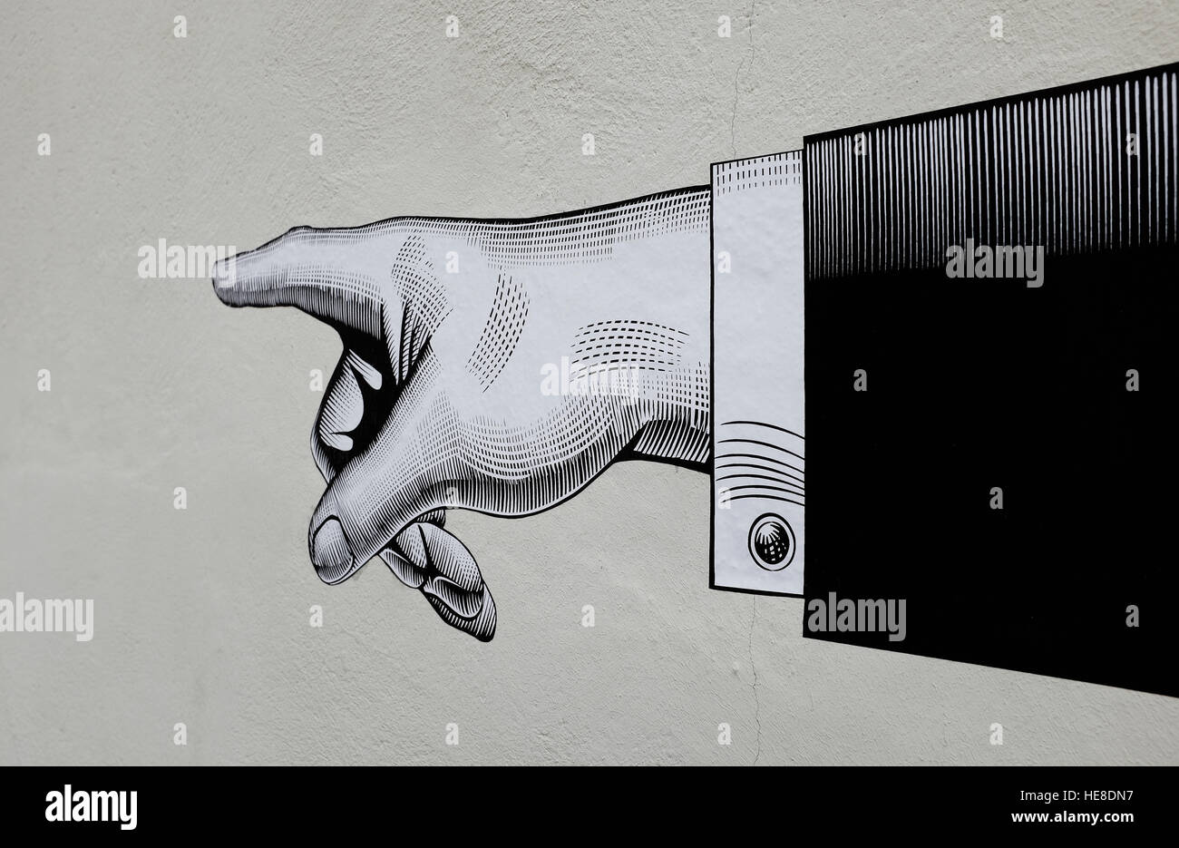 Abbildung von Hand auf Mauerbau Stockfoto