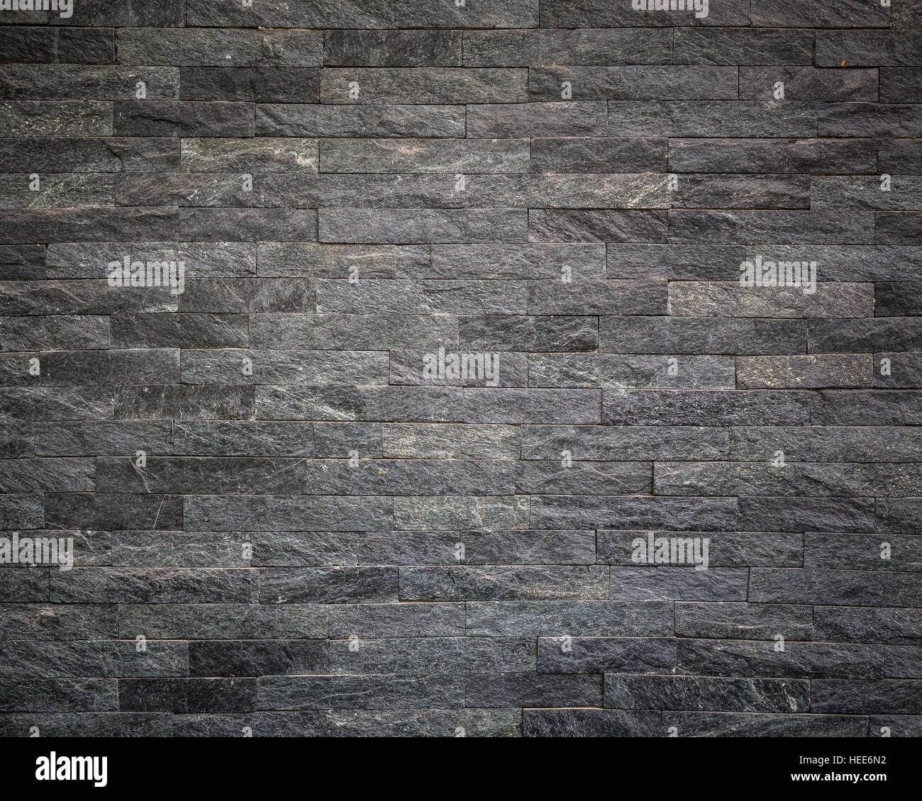 Muster von schwarzen Schiefer Wand Textur und Hintergrund Stockfoto