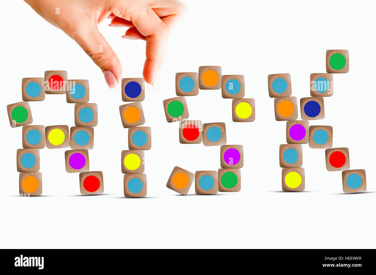 Risk-Konzept mit Holzteile eines Spiels bilden das Wort Risiko Stockfoto
