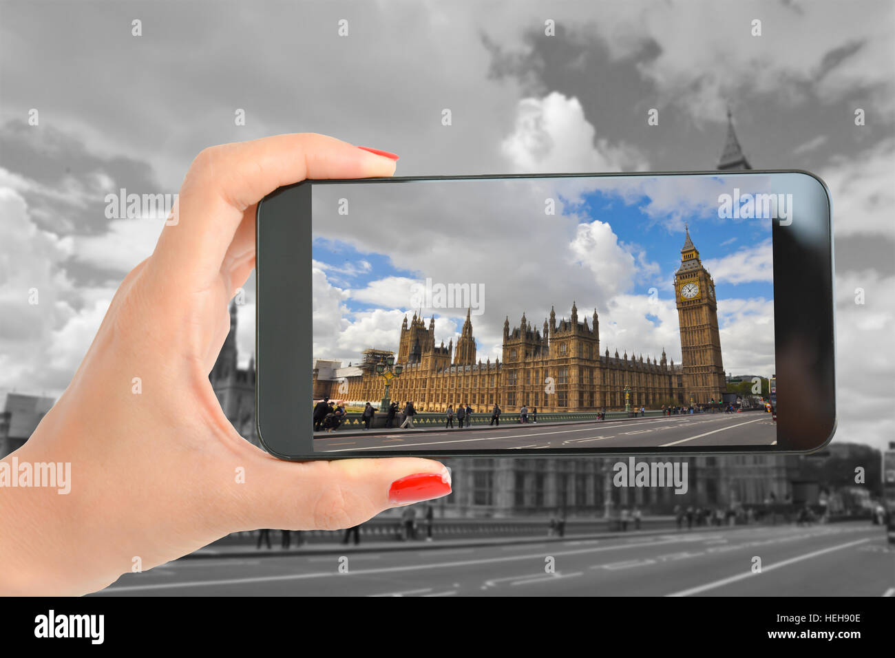 Frau, die ein Bild von Big Ben und der Palace of Westminster, London Stockfoto
