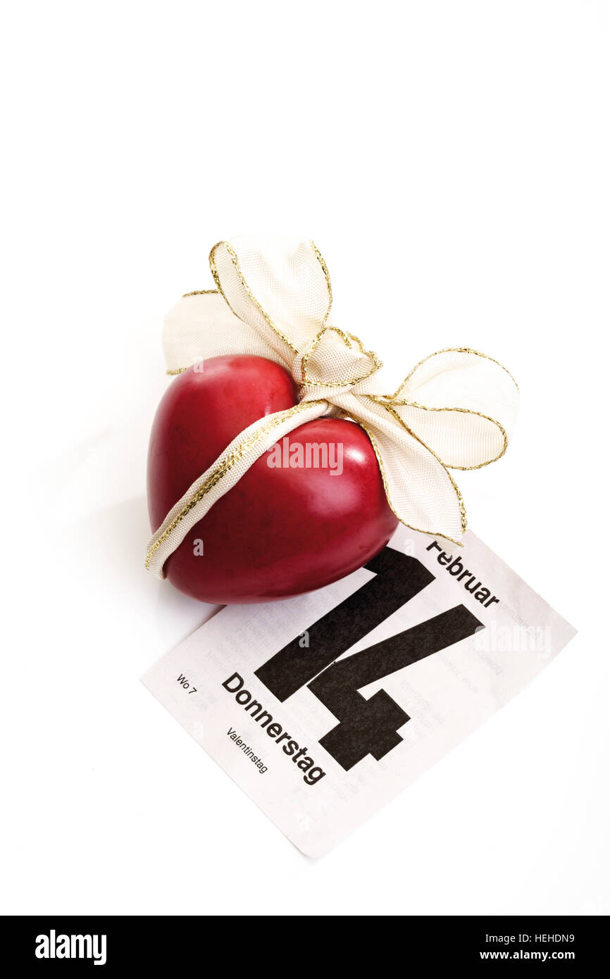 Herz mit Pfeil und Bogen zum Valentinstag Kalenderblatt gebunden Stockfoto