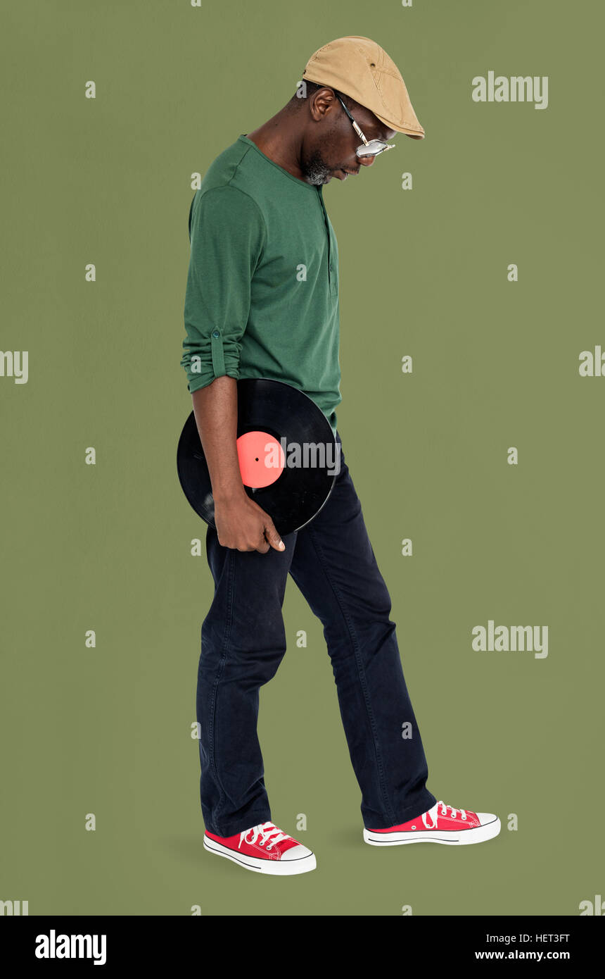 Mann hält Vinyl Retro-Konzept Stockfoto