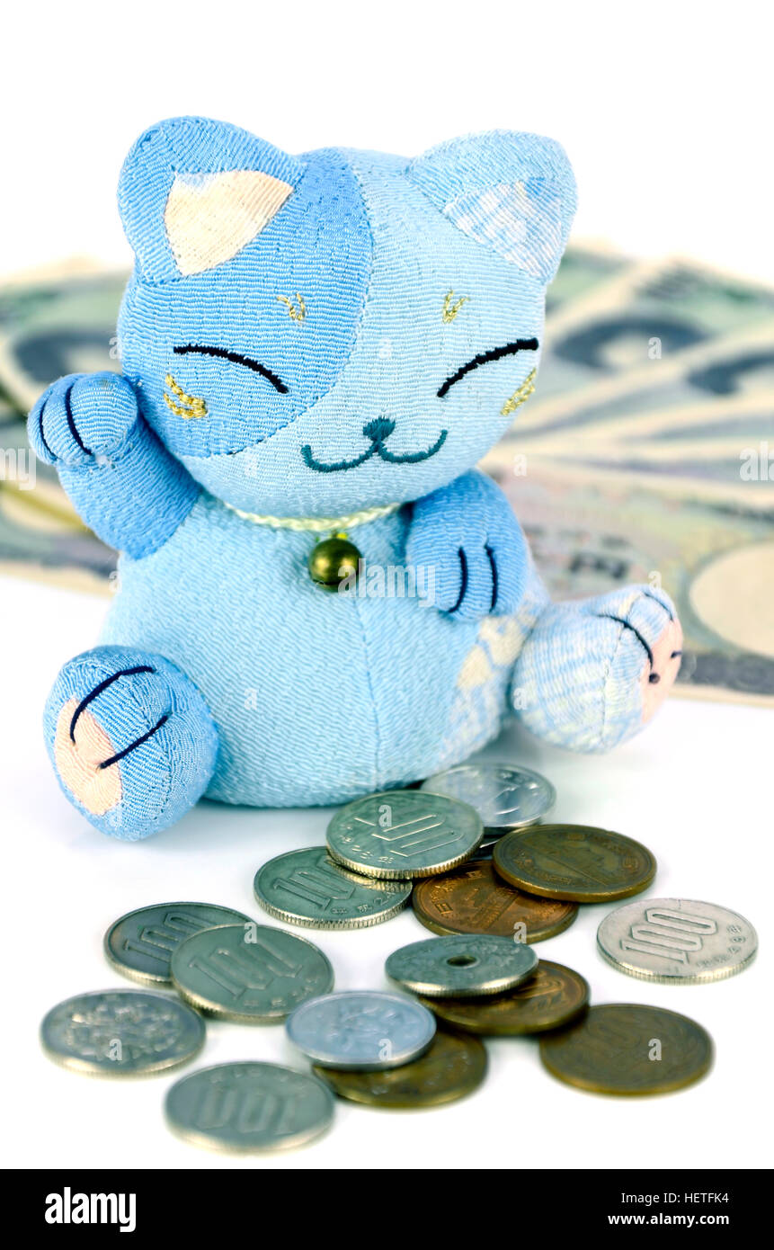 Maneki-Neko, die glückliche Katze und japanische Geld. Stockfoto