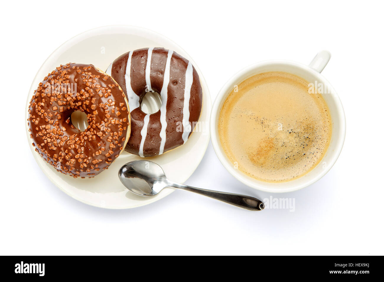 Krapfen und Kaffee isoliert auf weiss Stockfoto