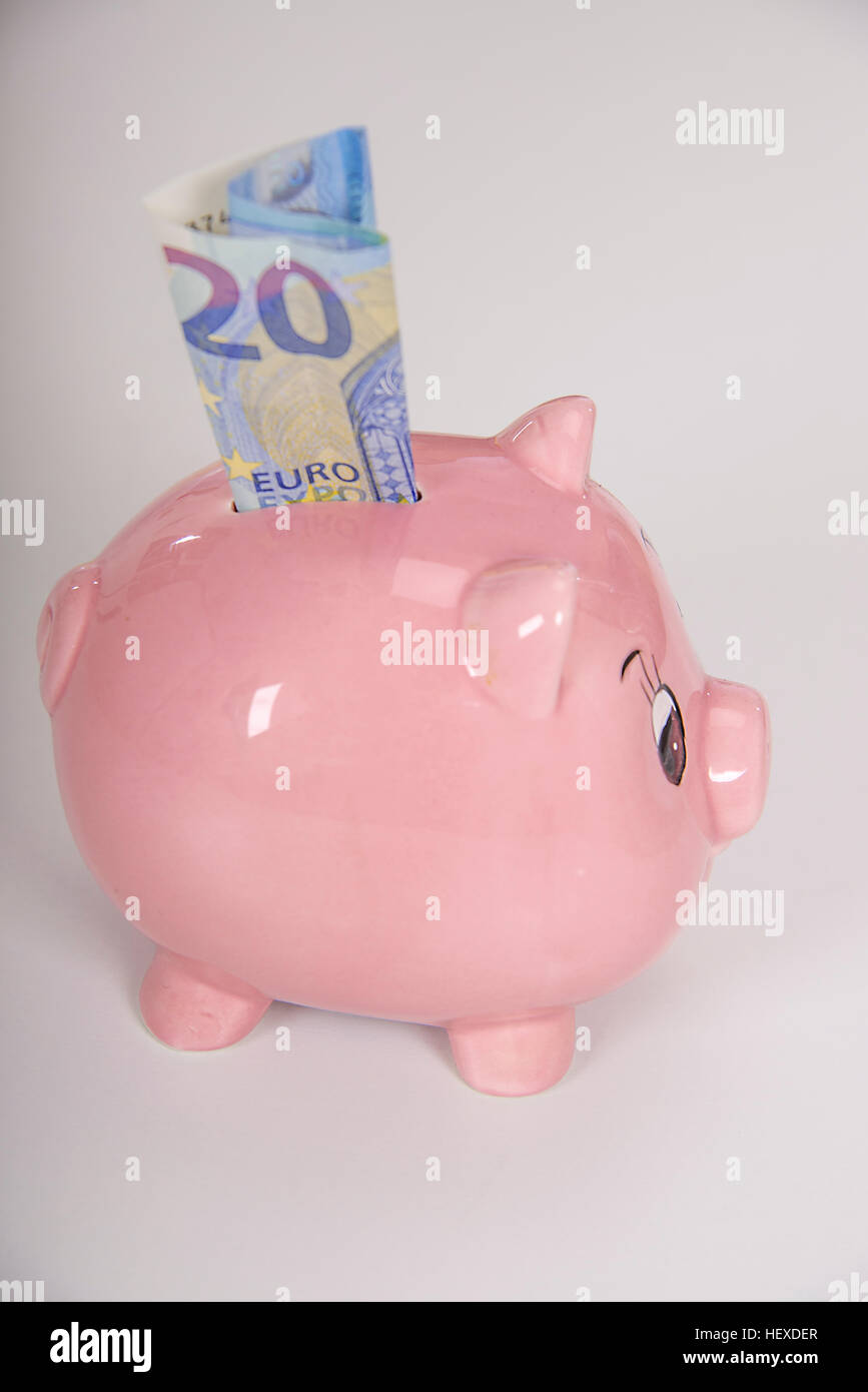 Sparschwein mit einem 20-Euro-Schein. Stockfoto