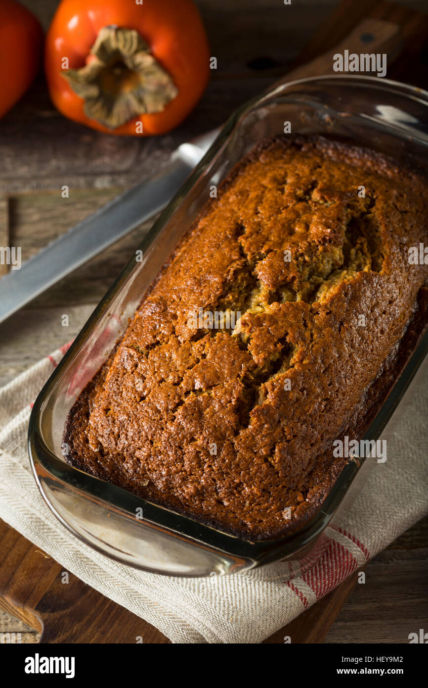 Hausgemachte süß Persimmon und Nussbrot bereit zu schneiden Stockfoto