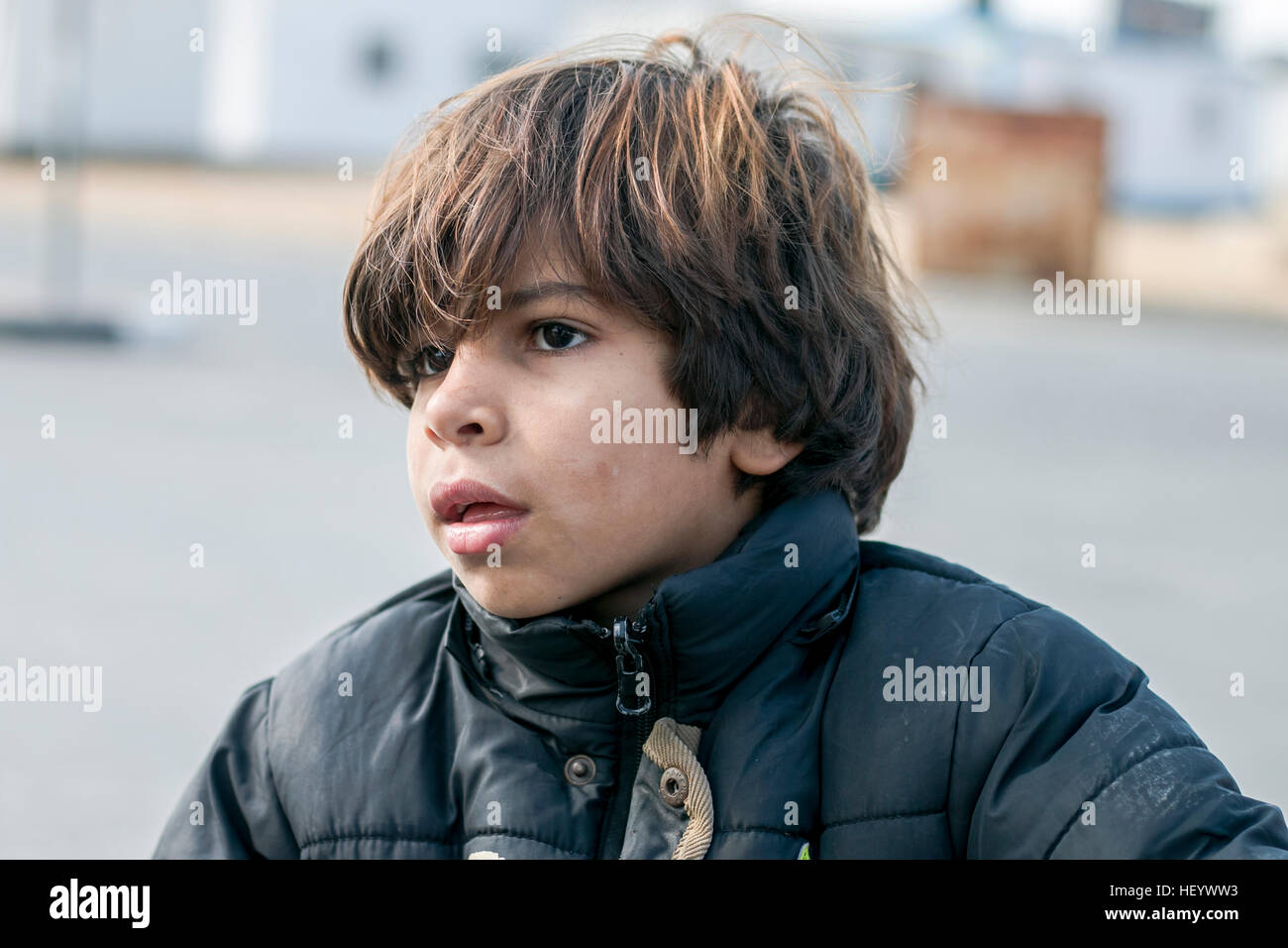 Boy-Face-Portrait-Winter-Sweater-Kid-Gaza-City-Mutasem-Ayad-Photo-MTSMAYAD-WYSIWYG-Fotografie Stockfoto