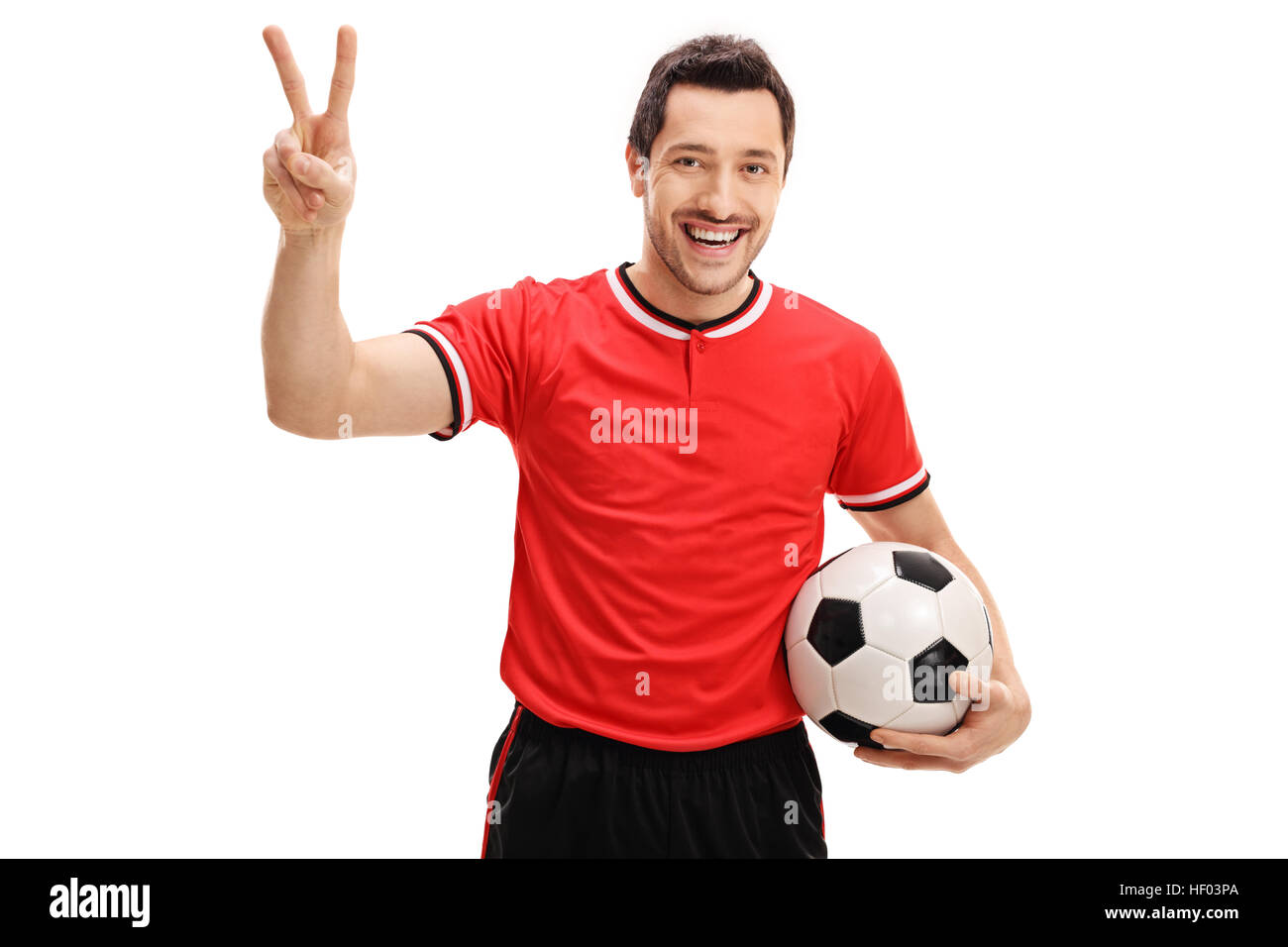 Begeistert-Football-Spieler einen Sieg Geste isoliert auf weißem Hintergrund Stockfoto