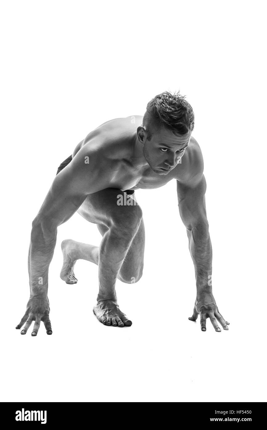 Mann für den Betrieb vorbereiten. Silhouette. isolieren Sie auf weiß. Schwarz / weiß Foto Stockfoto