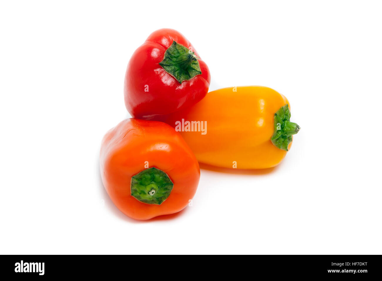 Drei süße Paprika isoliert auf weißem Hintergrund Stockfoto