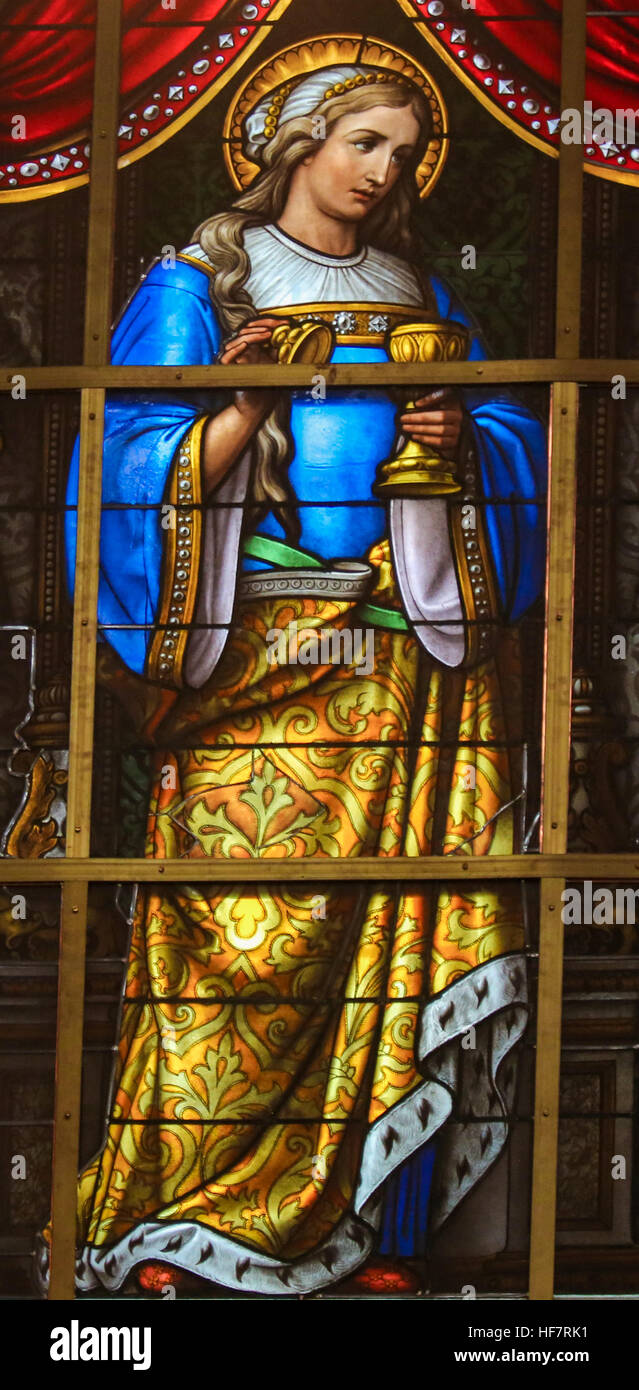 Glasmalerei in Saint Nicholas Church, Gent, Belgien, Mary Magdalene und eine Allegorie auf das Leiden Jesu darstellen. Stockfoto