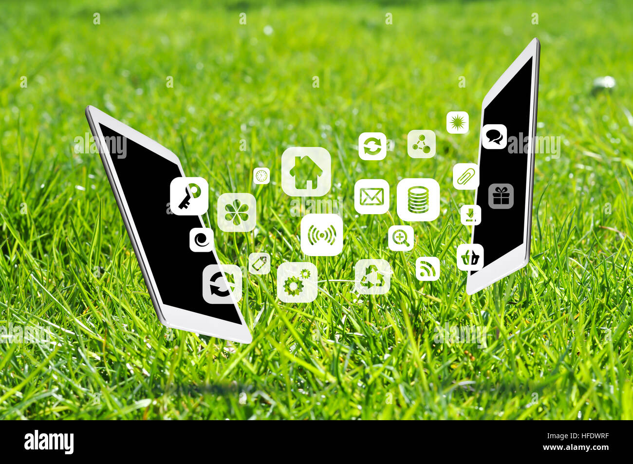 Aktie apps zwischen digitalen Geräten oder Tabletten Stockfoto