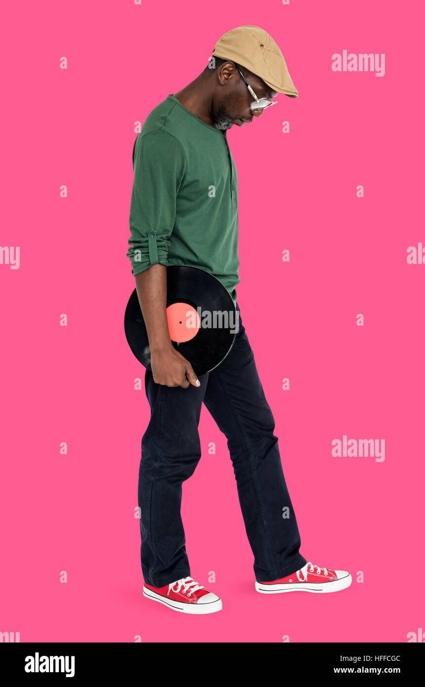 Mann hält Vinyl Retro-Konzept Stockfoto