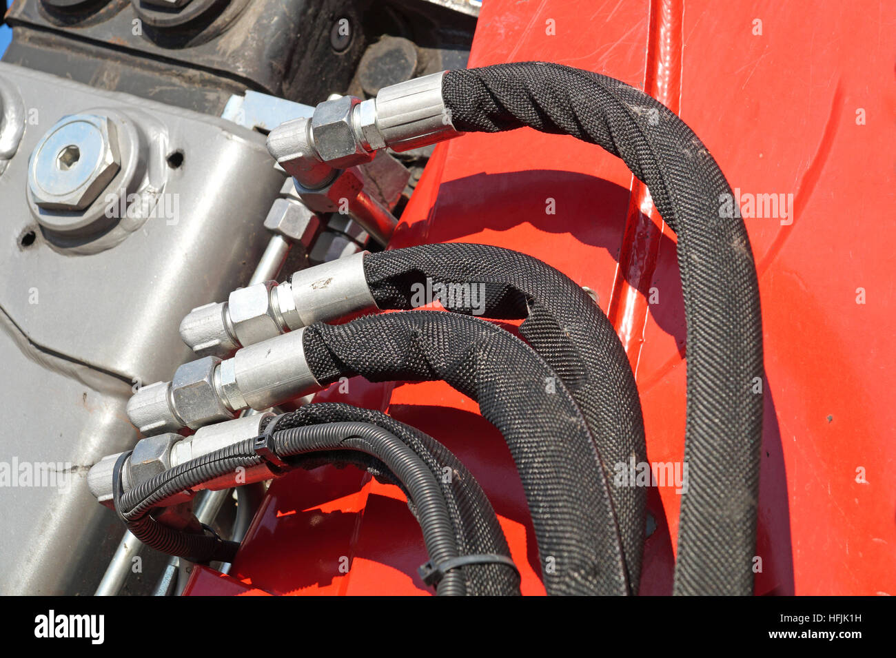 Hydraulikanschlüsse Schläuche eines industriellen Maschinen-Details, Stockfoto
