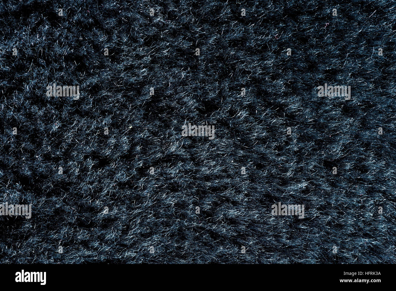 Schwarzes Fell natürliche Textur Closeup für Hintergrund Stockfoto