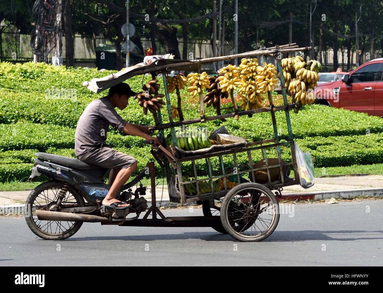 Rush Hour Pendler Auto taxis Motorroller Motorräder Pham Viet Chanh Straße - Nga Sau Cong Hoa Ho Chi Minh City (Saigon), Vietnam Stockfoto