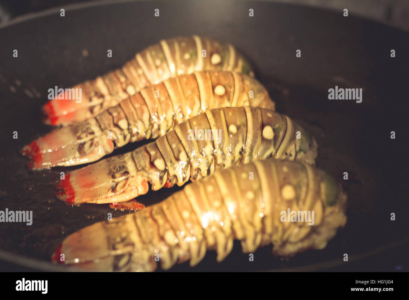 Foto von vier Hummerschwänze essfertig Stockfoto