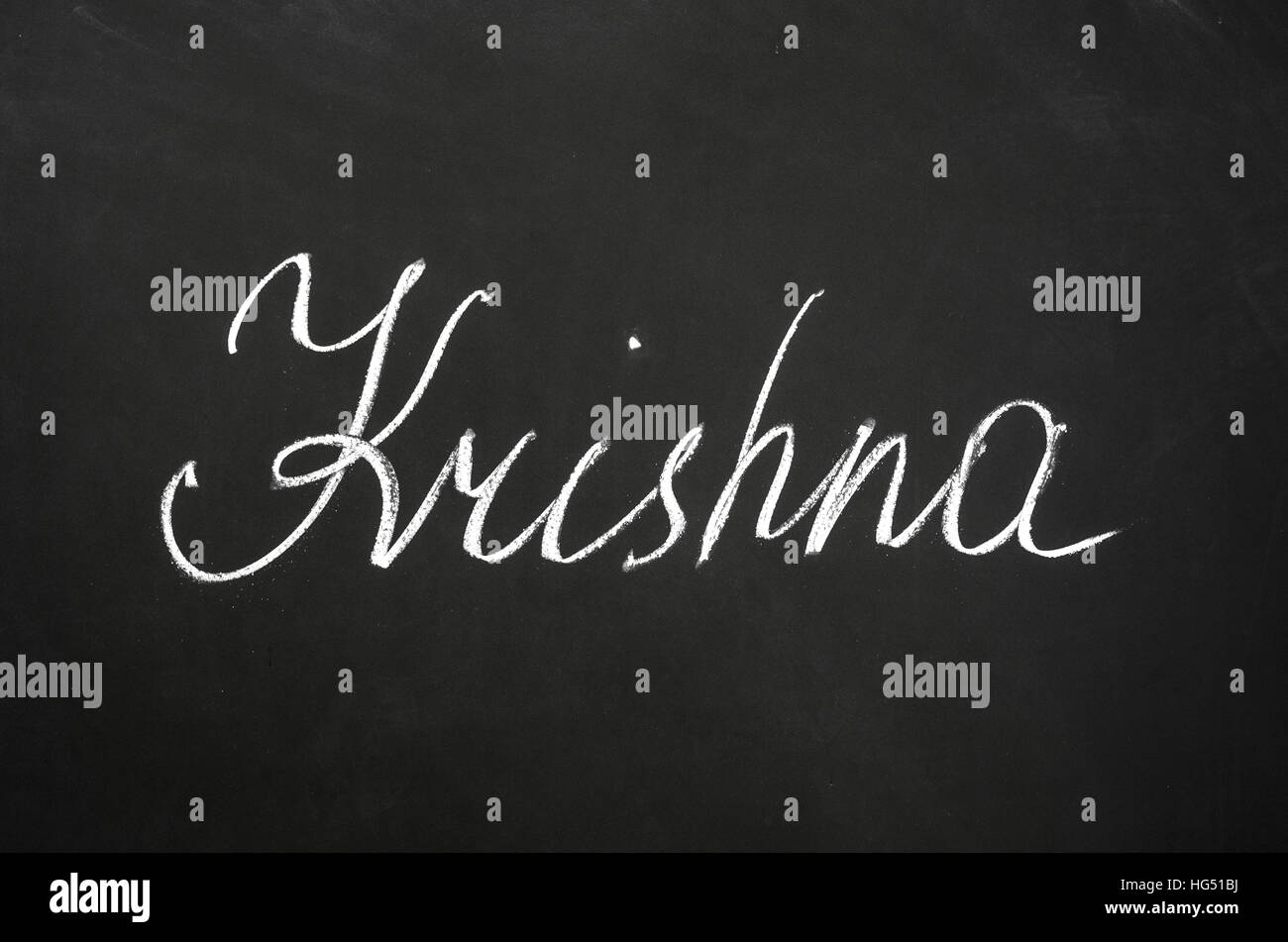 Das Wort "Krishna" Schreiben an die Tafel. Stockfoto