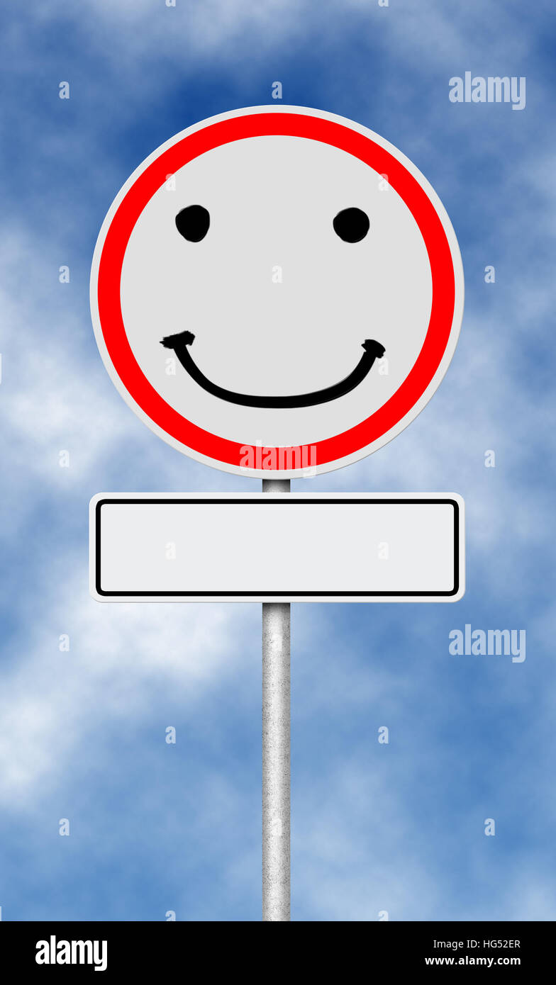 Verkehr und Straßenschild mit Smilie-Gesicht Stockfoto