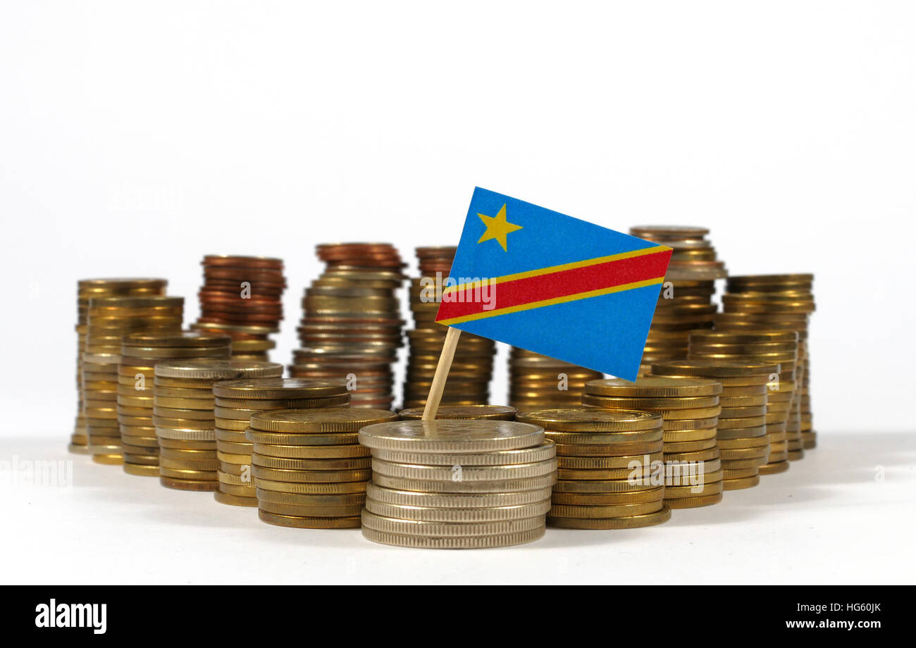 Demokratische Republik Kongo-Fähnchen mit Stapel von Geld Münzen Stockfoto