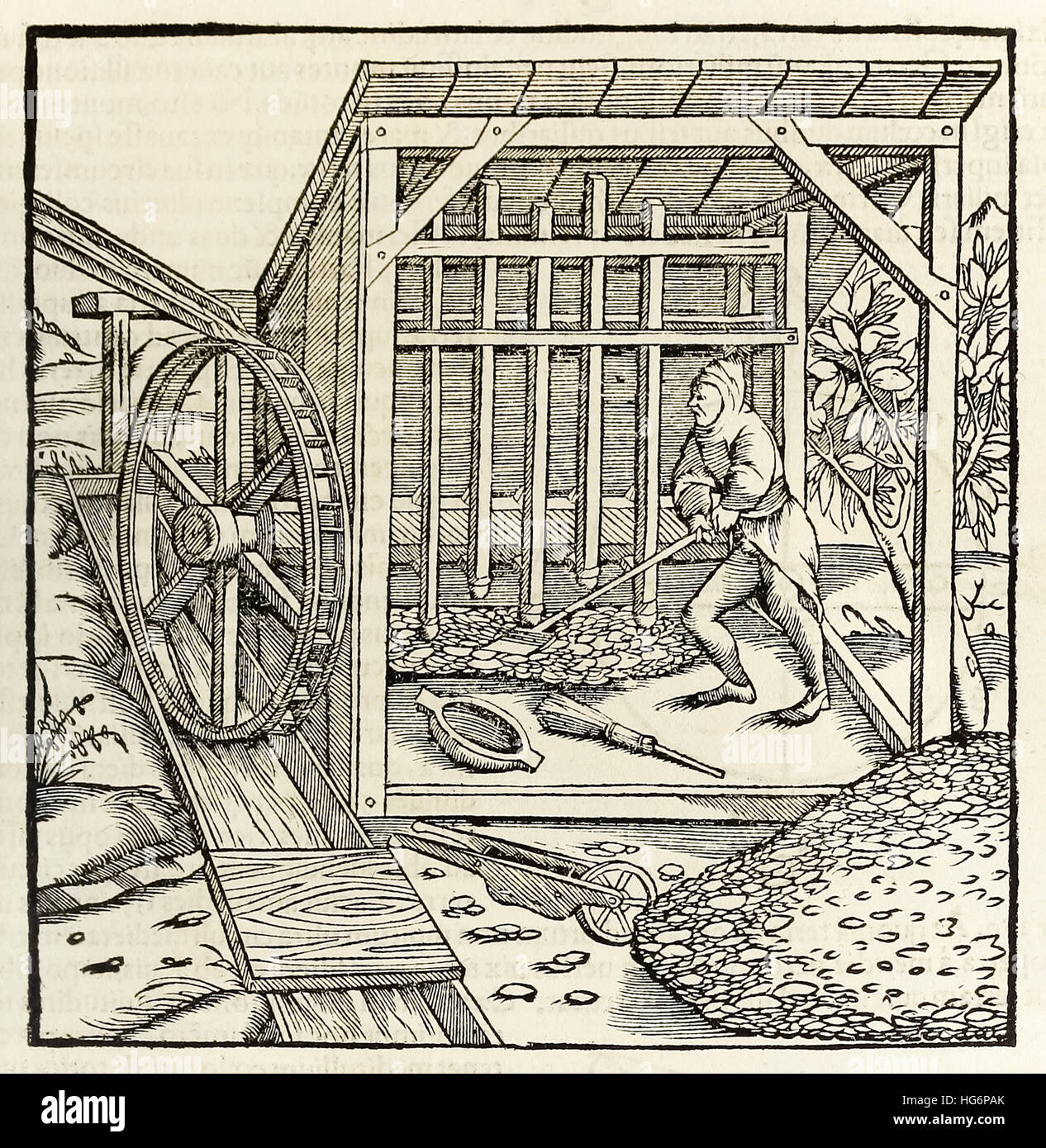 Der Bergbau mit Wasserrad, Holzschnitt von 1550-Ausgabe der "Cosmographia" von Sebastian Münster (1488-1552). Siehe Beschreibung für mehr Informationen. Stockfoto