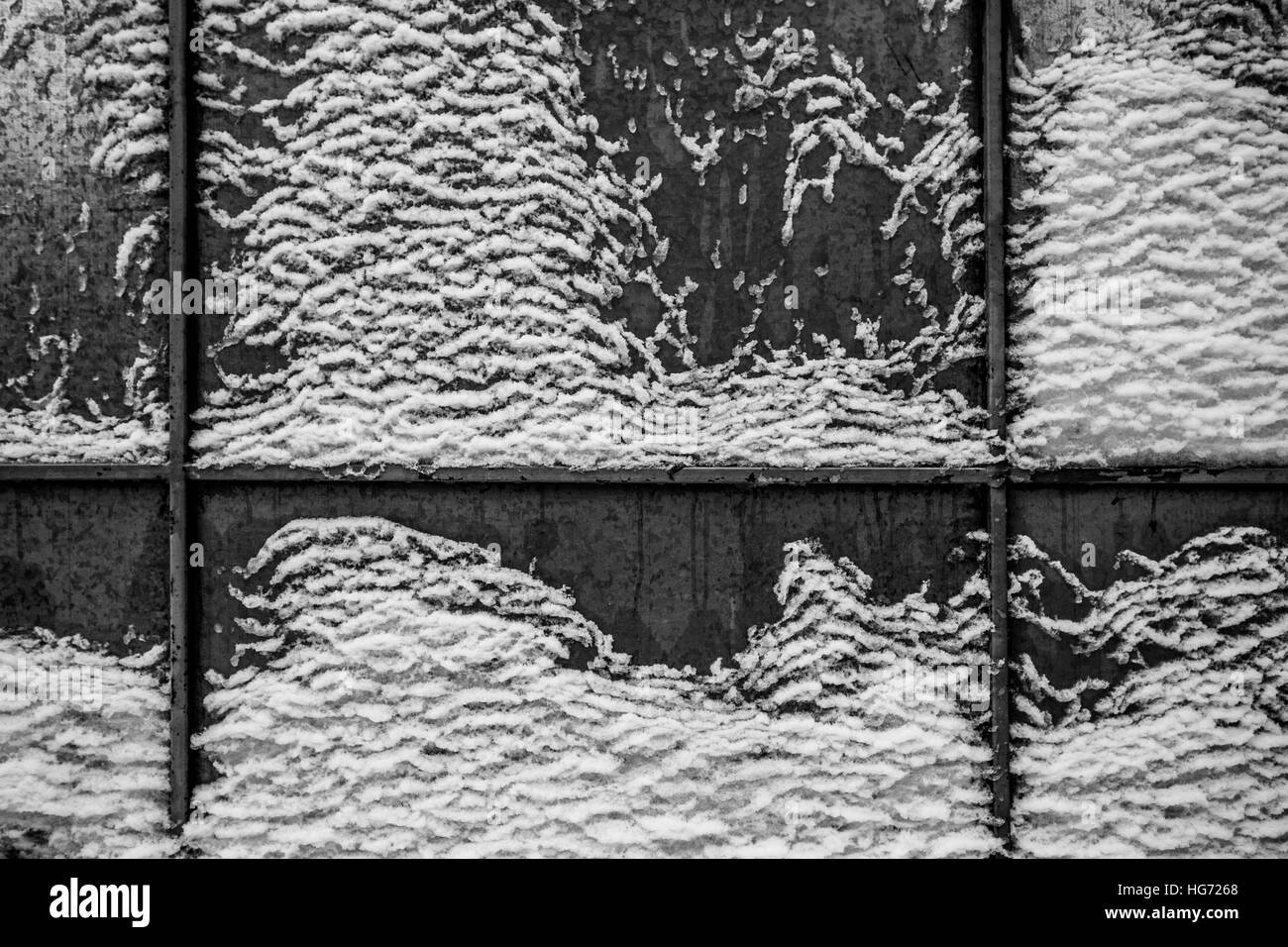 Eis auf metallische Fläche Stockfoto