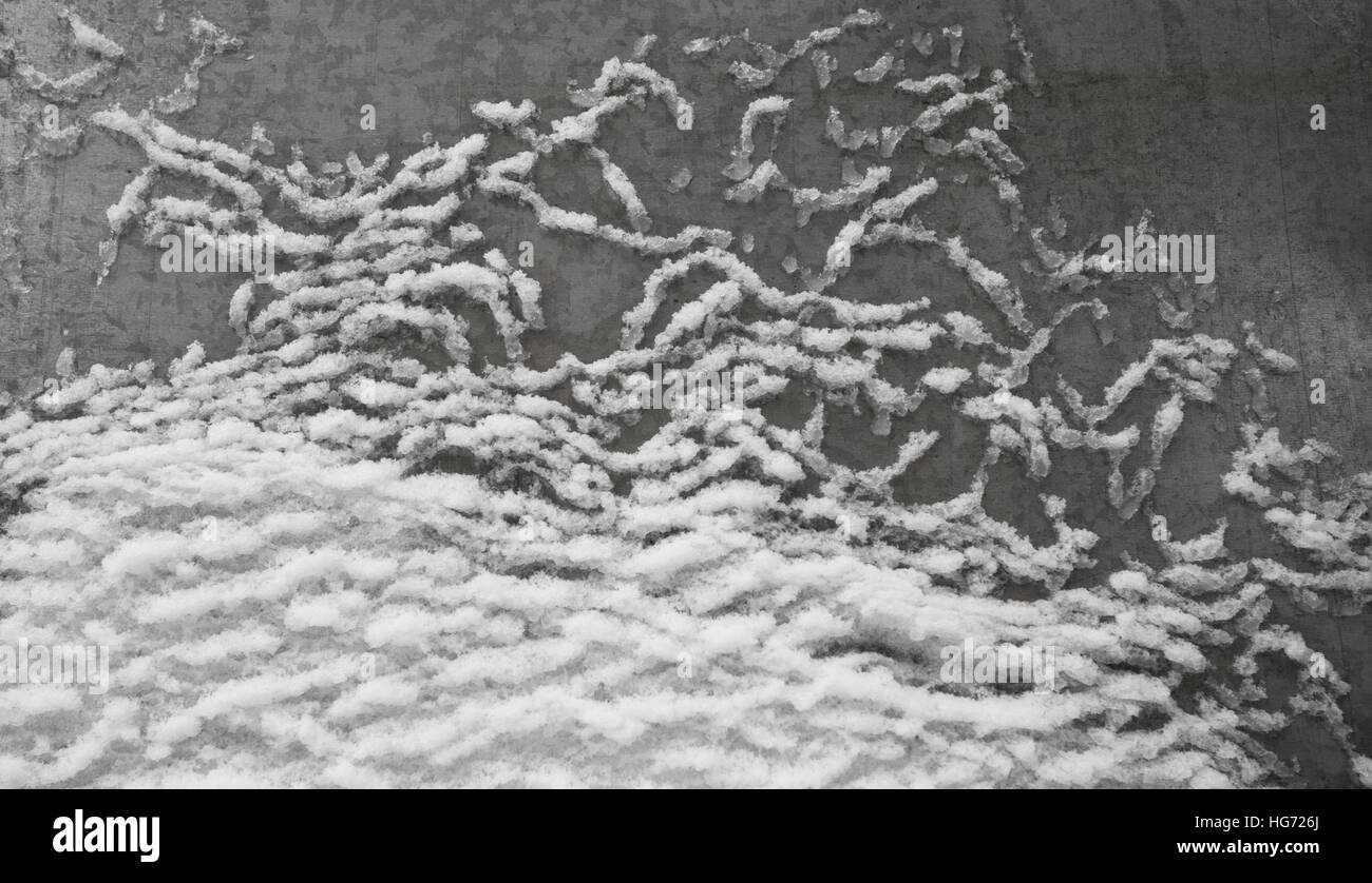 Eis auf metallische Fläche Stockfoto