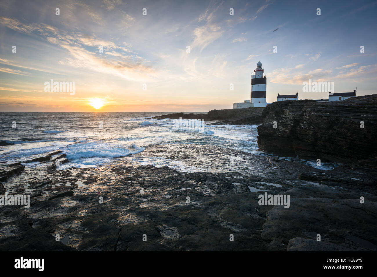 Hook Head Lighthouse in County Wexford, Irland, bei Sonnenuntergang Stockfoto
