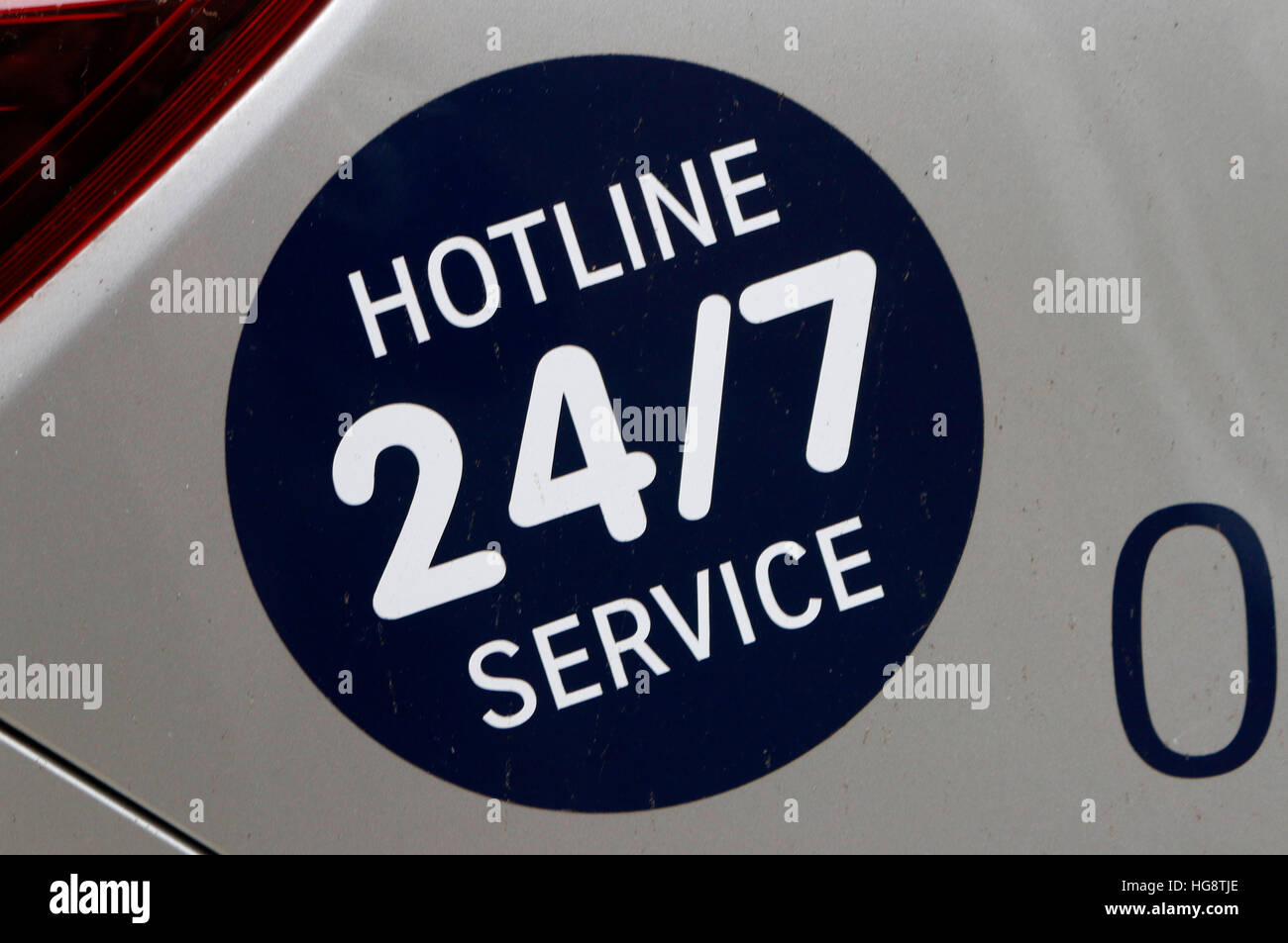 Das Logo der Marke "Hotline 24/7-Service", Berlin. Stockfoto