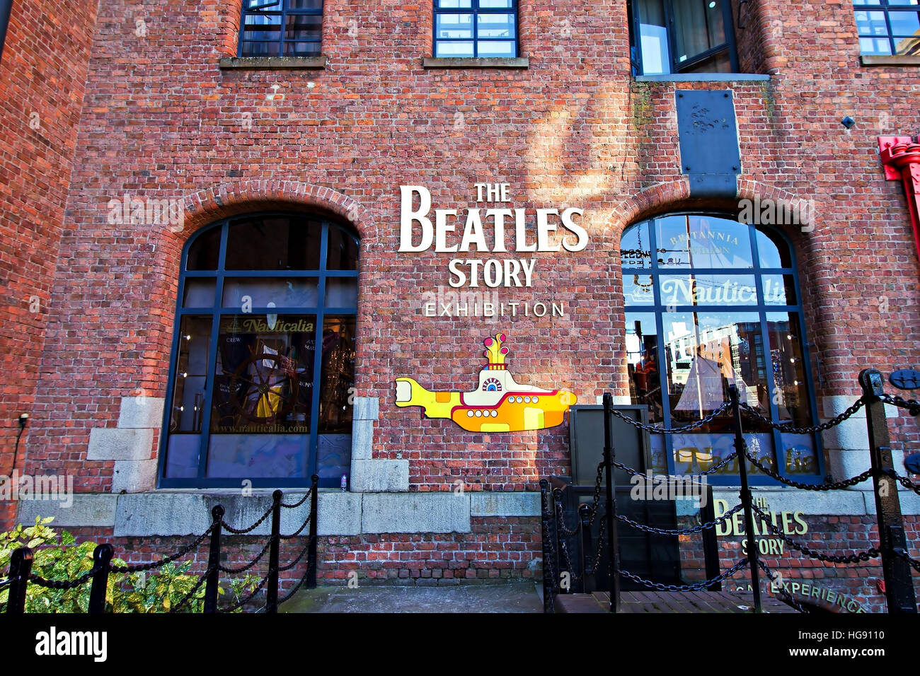 Die Beatles Geschichte Ausstellung Schild am Albert Dock, Liverpool, UK. Eine beliebte Touristenattraktion. Stockfoto