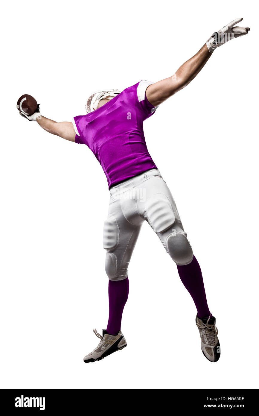 Football-Spieler mit einer rosa Uniform machen ein Fang auf weißem Hintergrund. Stockfoto