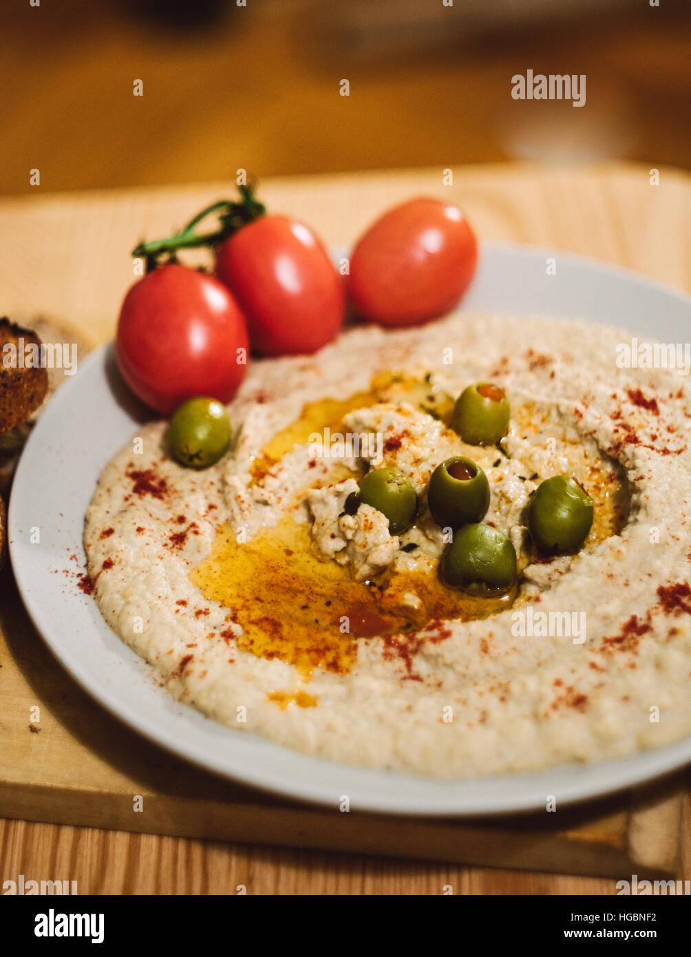 Hausgemachte Humus Essen. Stockfoto