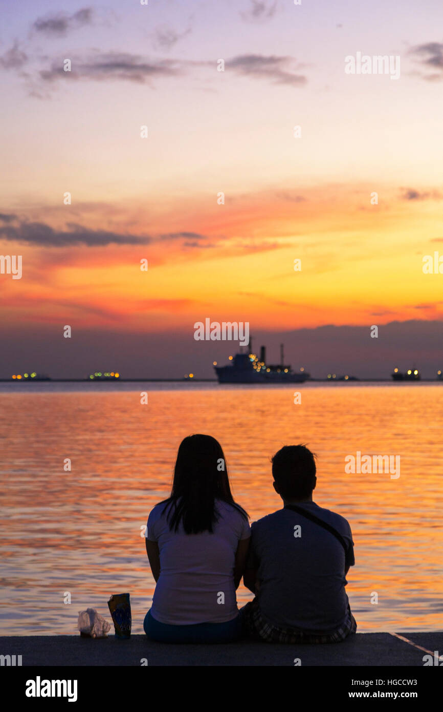 Philippinische paar Sonnenuntergang, Manila, Bay, Philippinen Stockfoto
