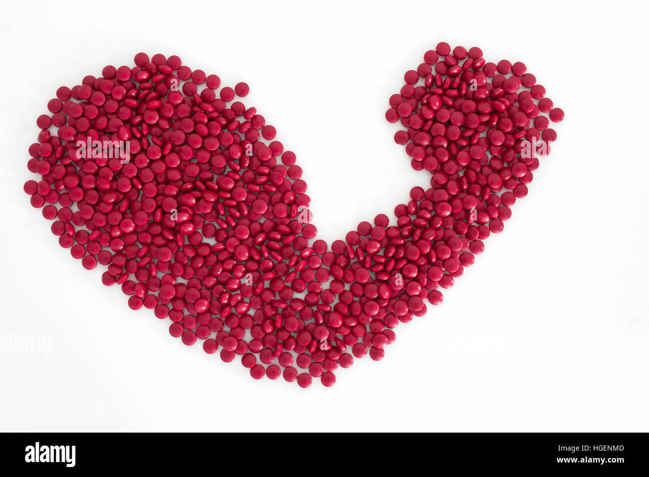 Tabletten Medizin Muskelform isoliert auf weiss Stockfoto