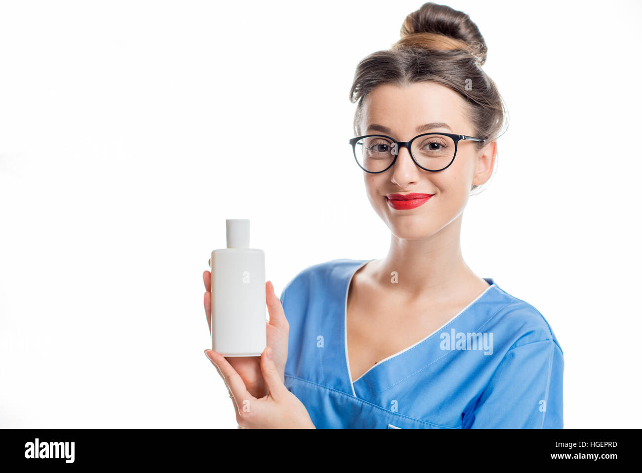 Kosmetikerin mit Flasche Stockfoto