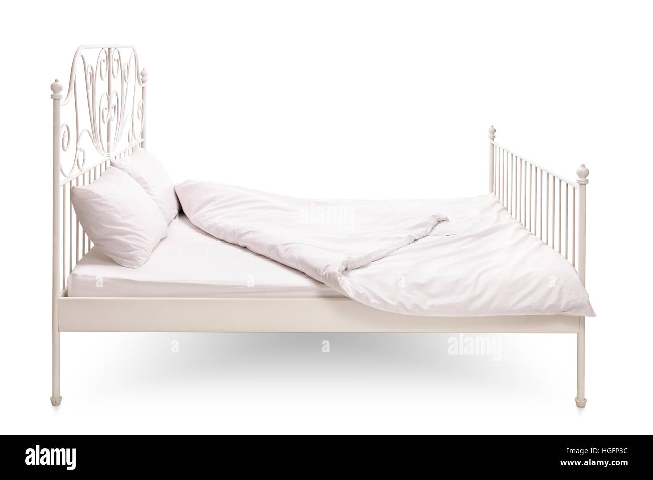 Bett, isoliert auf weißem Hintergrund Stockfoto
