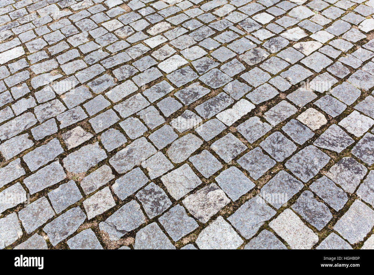 Grauer Granit gepflasterten Gehweg Bürgersteig Textur Stockfoto