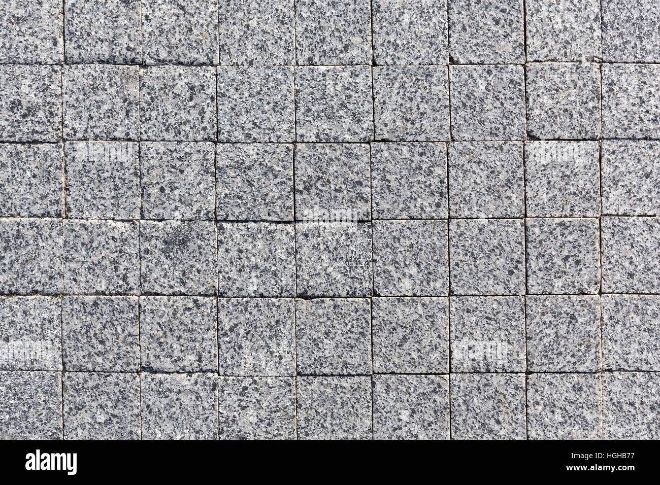 Dunklen Granit Pflasterstein Bürgersteig Textur Hintergrund Stockfoto