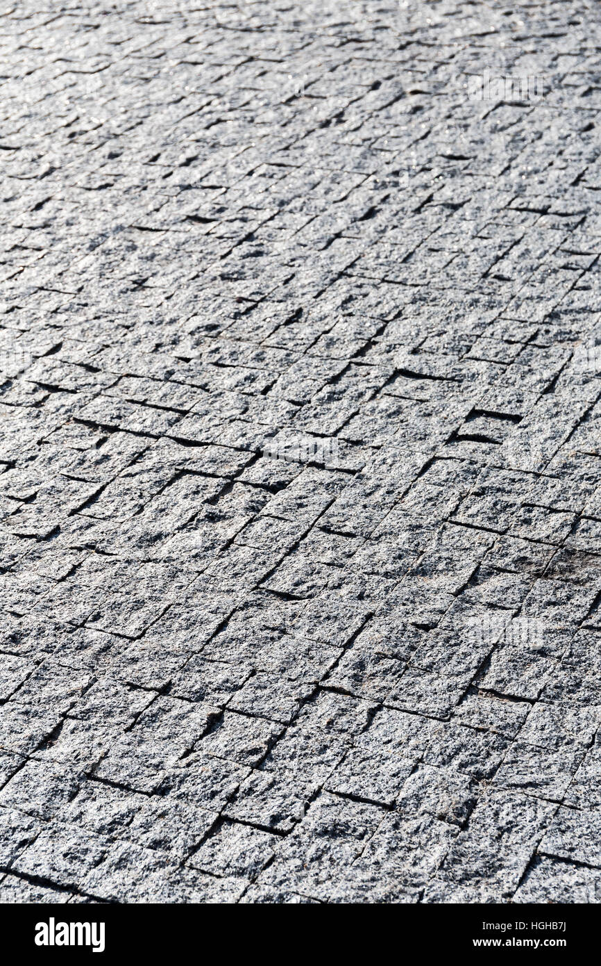 Gepflasterten Gehweg gemacht kleine kubische Natursteine Stockfoto