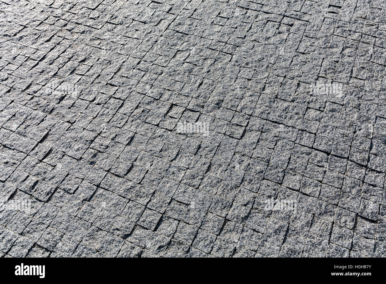 Straßenansicht der quadratischen Fliesen Granit Pflaster Stockfoto
