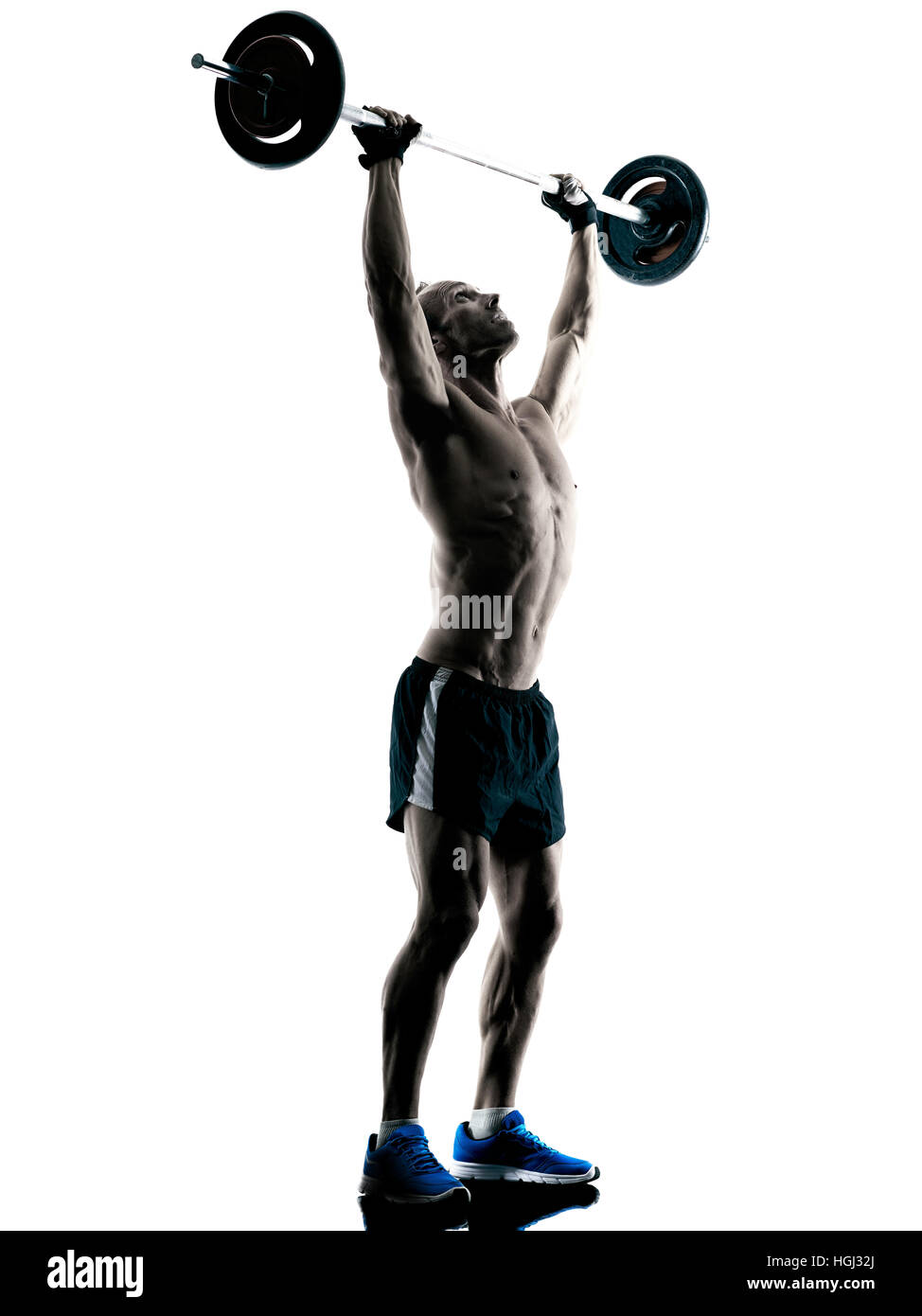 ein kaukasischer Mann trainieren Fitness Bodybuilding-Übungen im Studio Silhouette isoliert Stockfoto