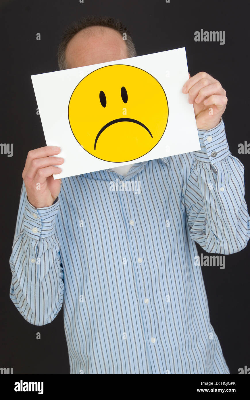 Mann mit traurigen Smiley-Gesicht Stockfoto