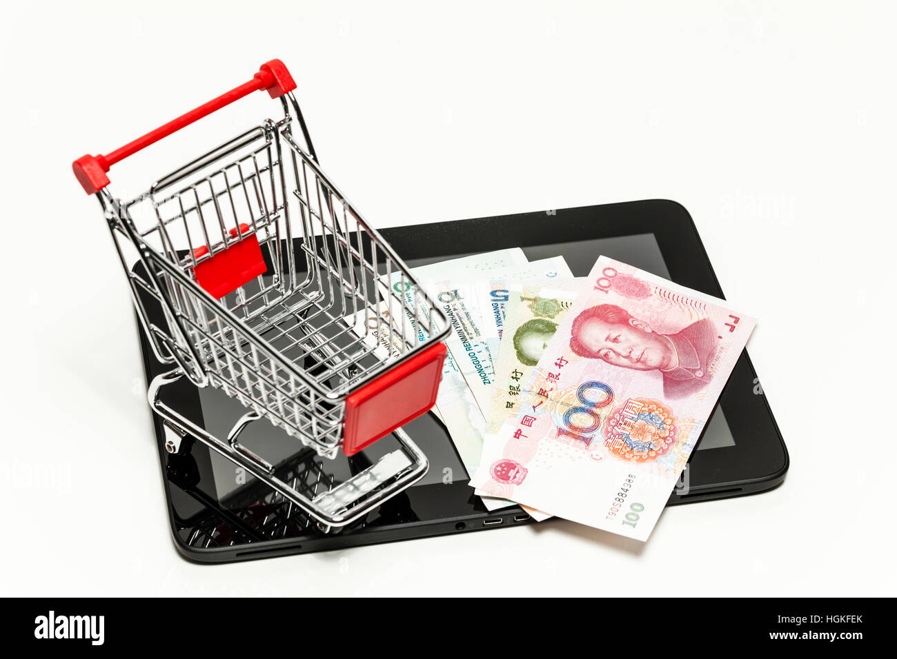 Yuan Banknots, Tablet-Computer und shopping Cart (Symbolfoto) Stockfoto