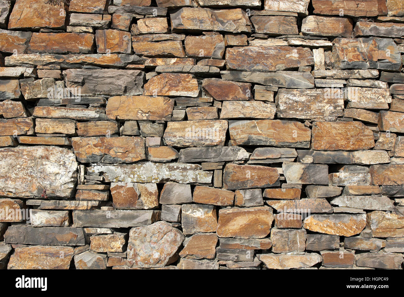 Natursteinmauer für Nutzung im Hintergrund Stockfoto