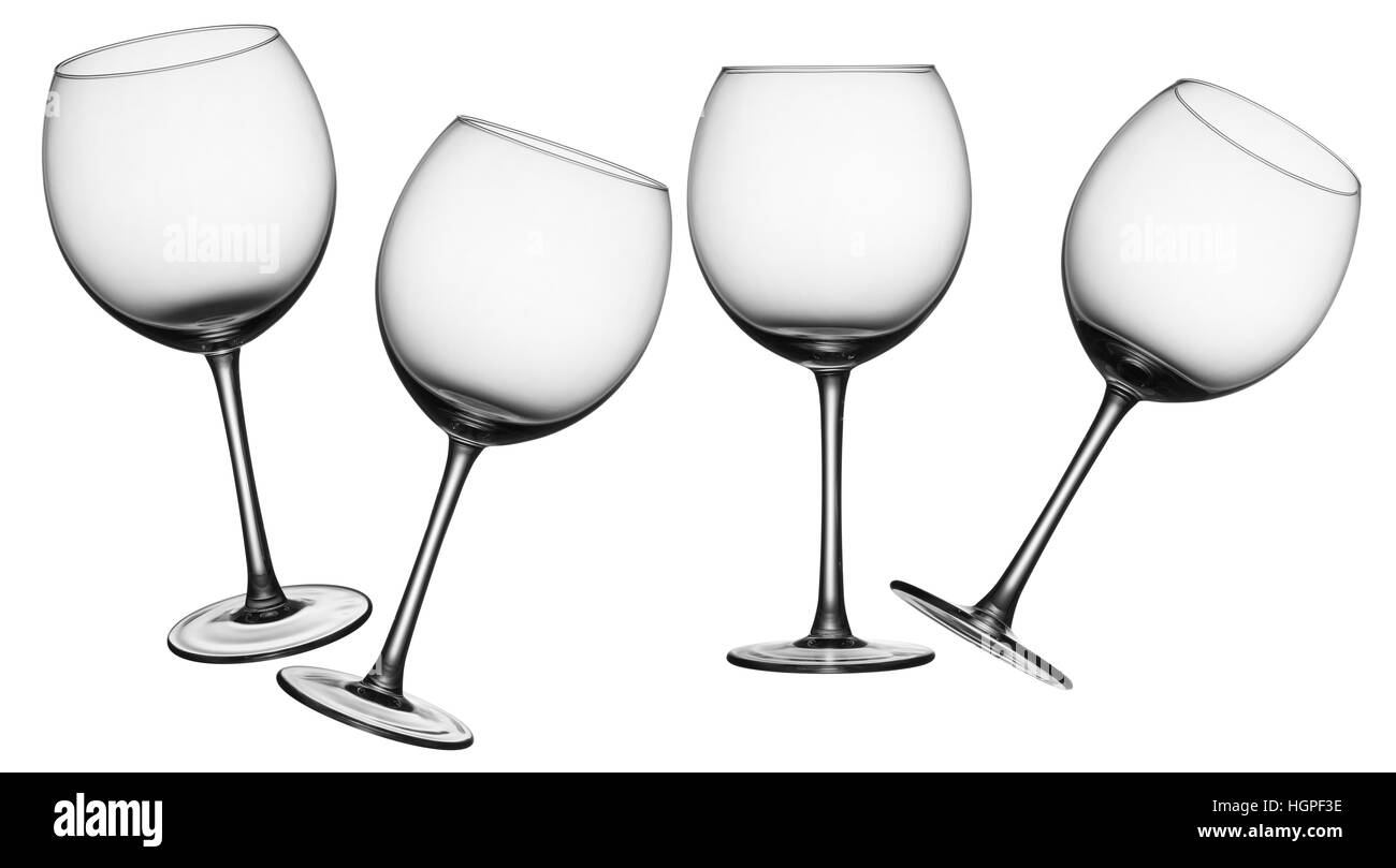 leere Gläser Wein in vier verschiedenen Winkeln Stockfoto